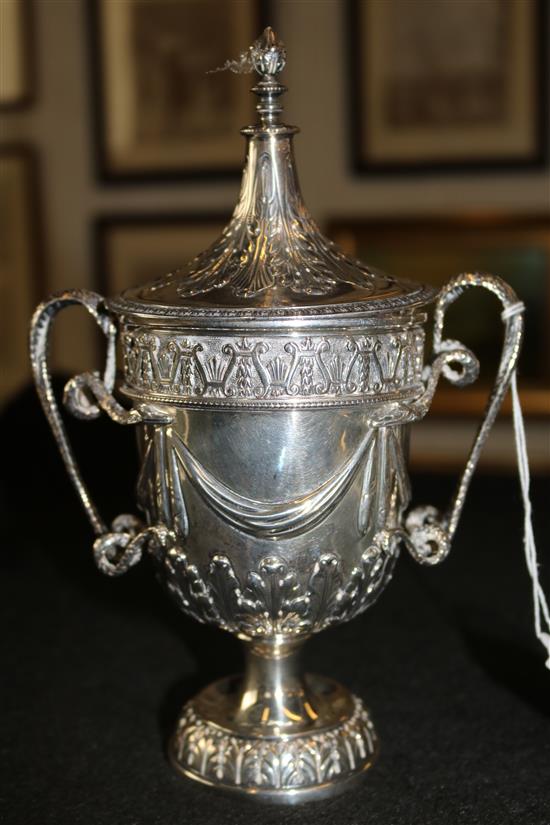 Ornate silver two handled cup